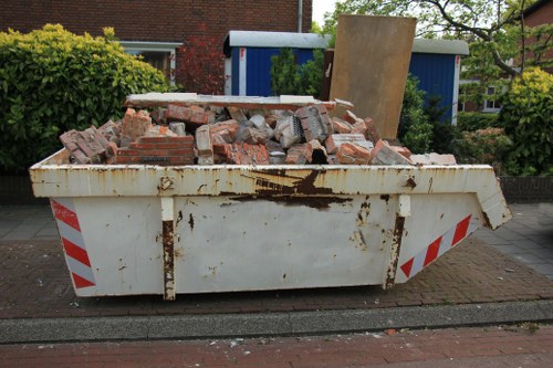 Old furniture ready for disposal in Kensington